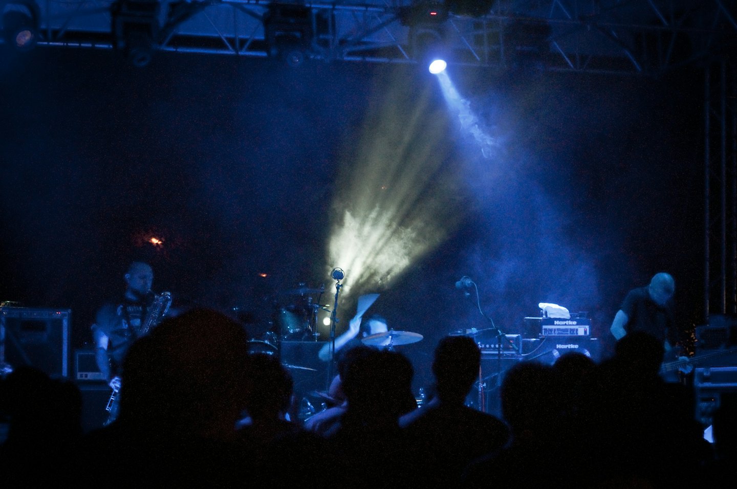 A jazz band performs on stage for a live audience.